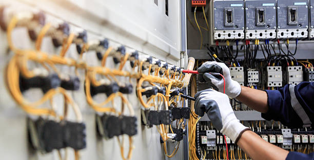 Professional Electrician technician working in Welsh, LA